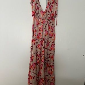 Beautiful silk dress.  Size large. Perfect for spring.  Brand new with tags.
